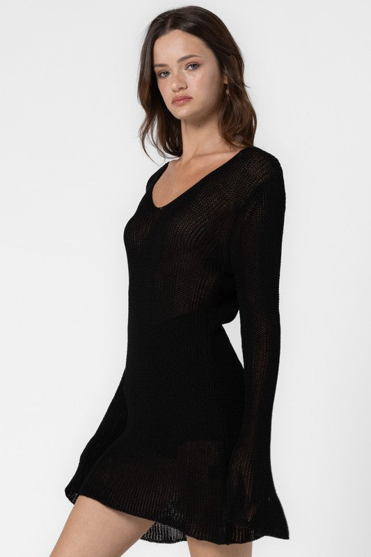 Featuring a knitted V-neck longsleeve cover up dress in the color black 