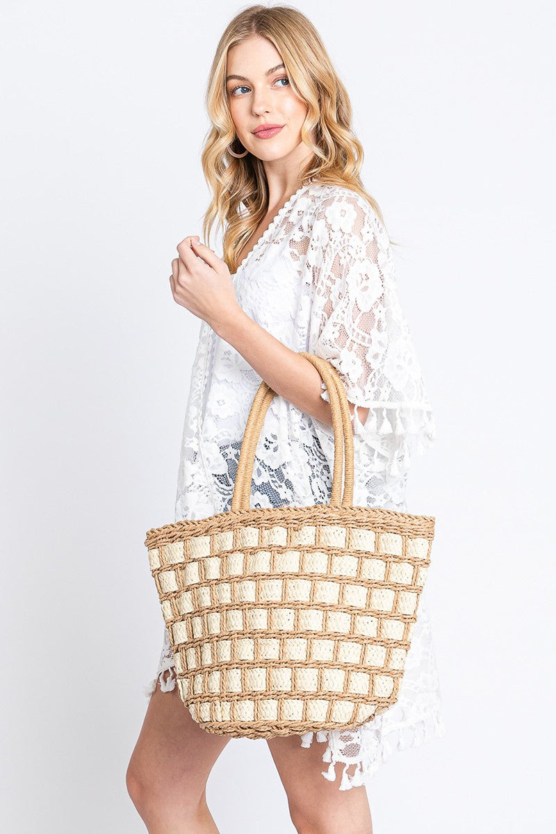 Featuring a woven Two-Tone shoulder bag in the color taupe 