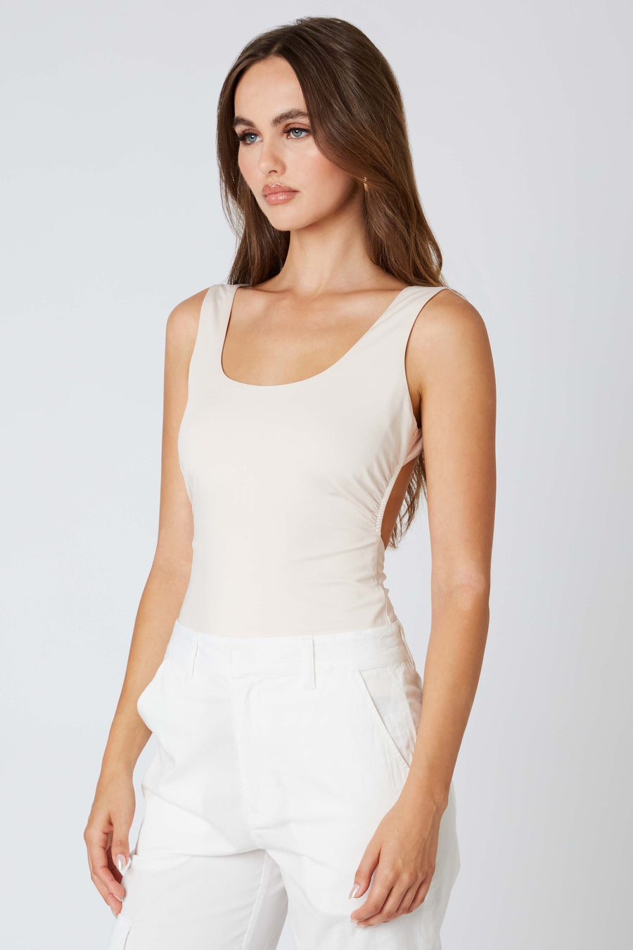 Square neck tank with open back.