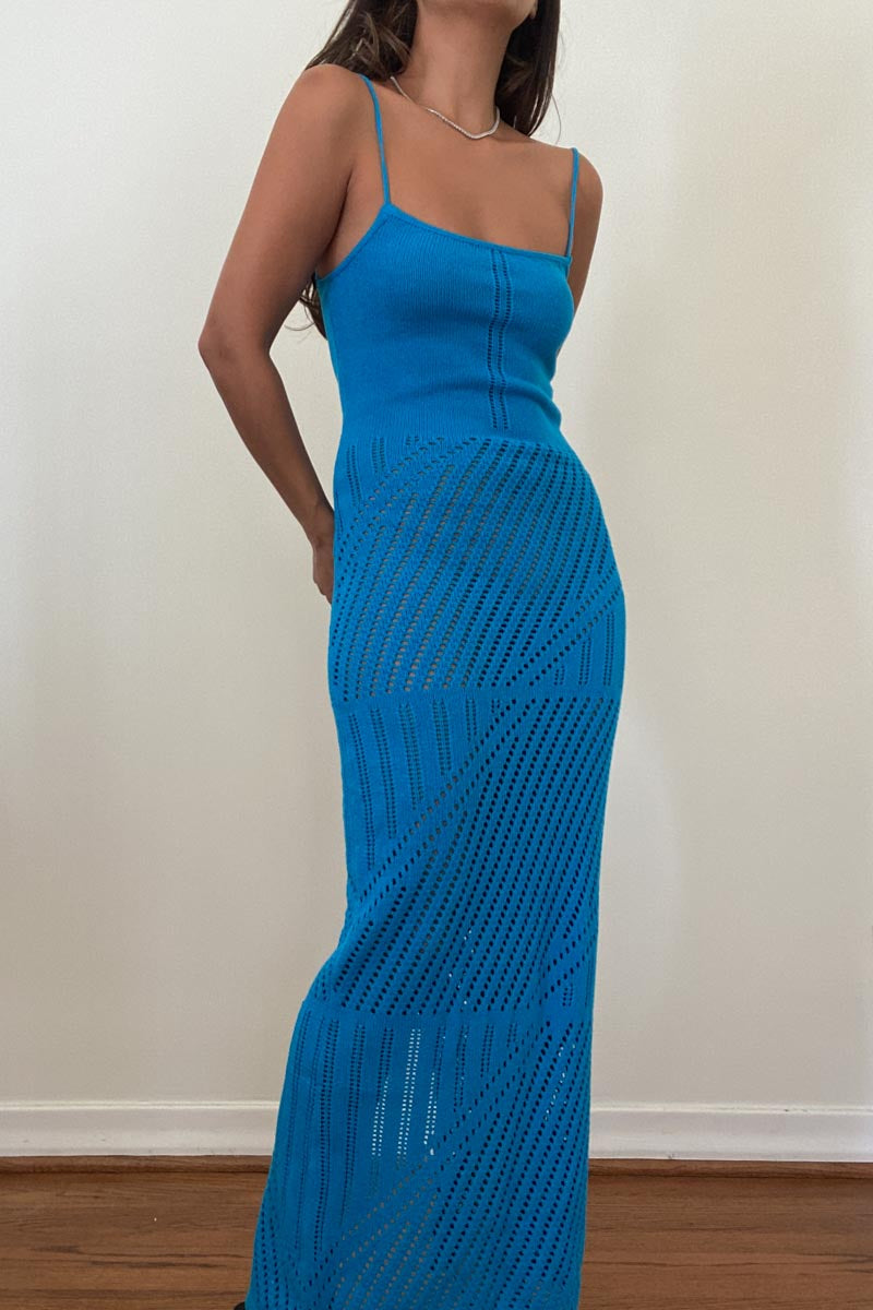 Featuring a knitted maxi dress in the color blue 