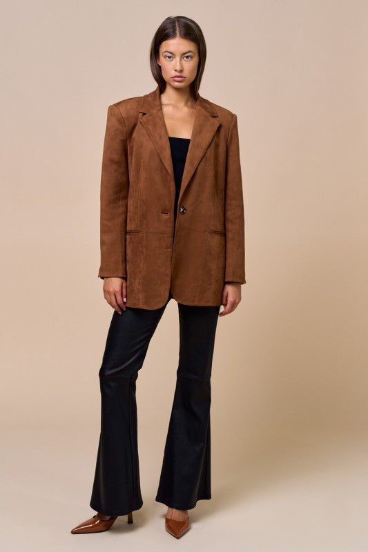 Featuring a structured suede blazer