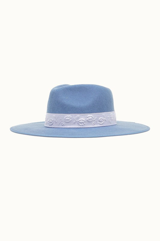 Featuring a beautiful pinched crown rancher hat with detailed band design and adjustable inner drawstring for sizing in the color powder blue