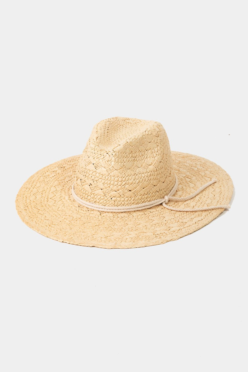 Featuring a woven hat in the color ivory 
