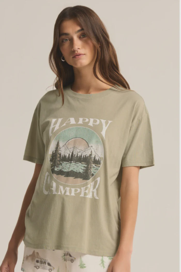 Featuring a a meadow green color and white font with the slogan "Happy Camper" with a boyfriend fit