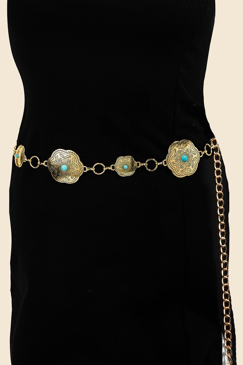 Featuring a gold chain belt with blue stone detail