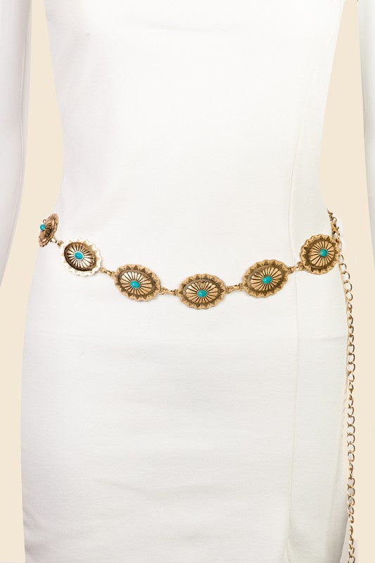 Featuring a golden chain belt with blue stone detail 
