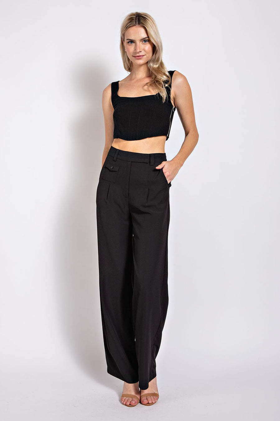 Linen crop top featuring pleated details and zipper. 