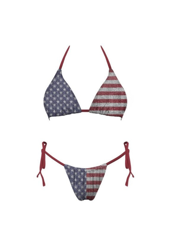 Featuring an american flag print string bikini in the colors red white and blue