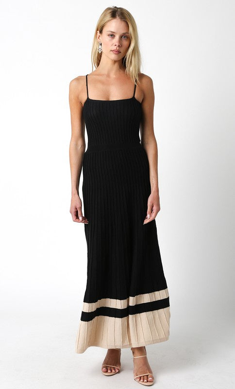 Featuring a ribbed knit sleeveless maxi dress in the color tan and khaki 