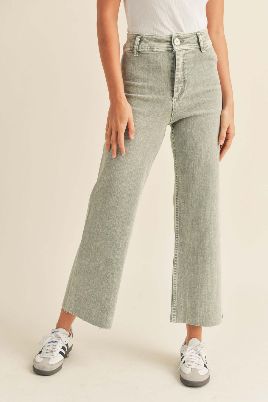 Sage cropped pants with belt loops and highwaisted fit. 