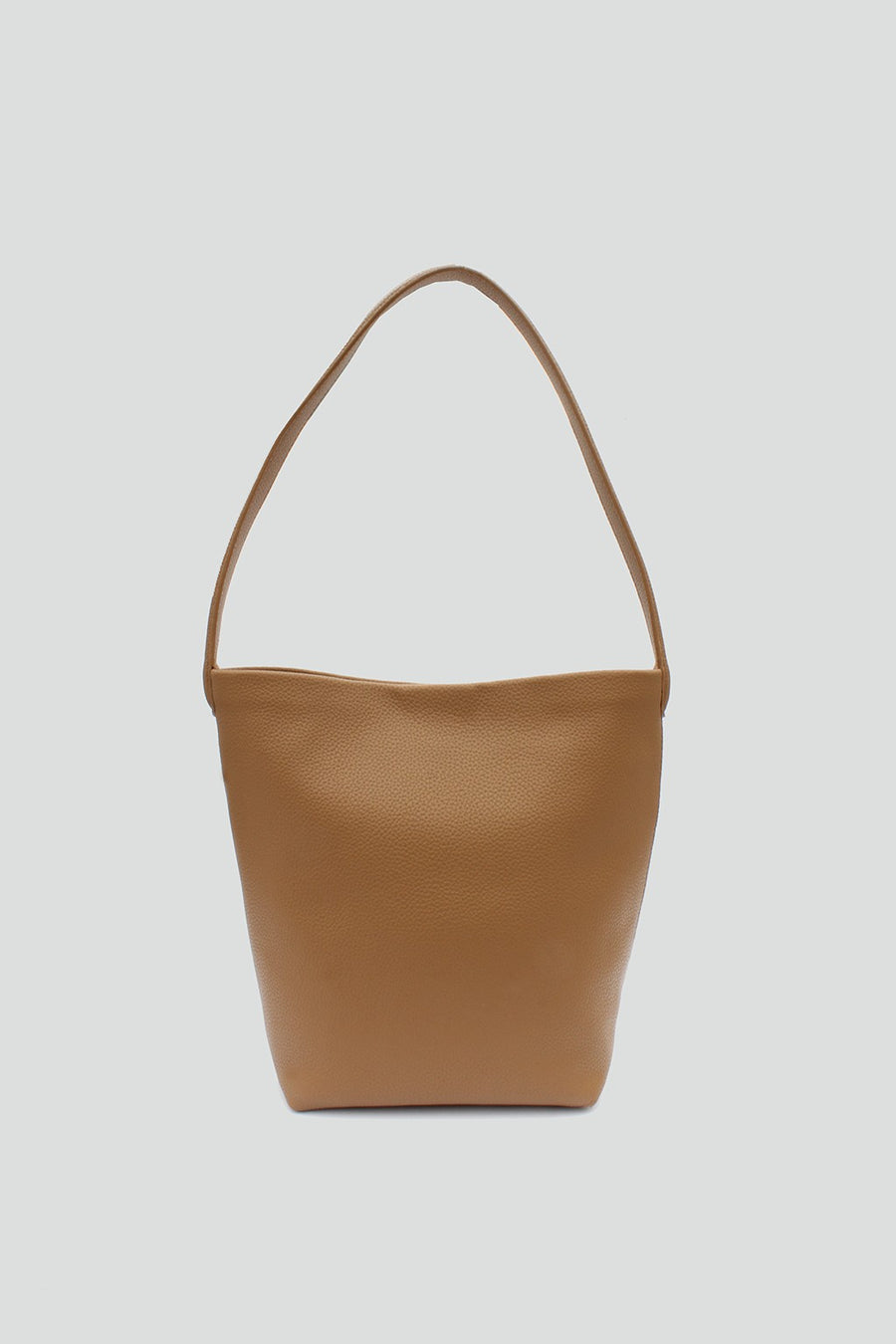 Featuring a classic tote style bag with magnetic closure and includes a mini pouch in the color tan