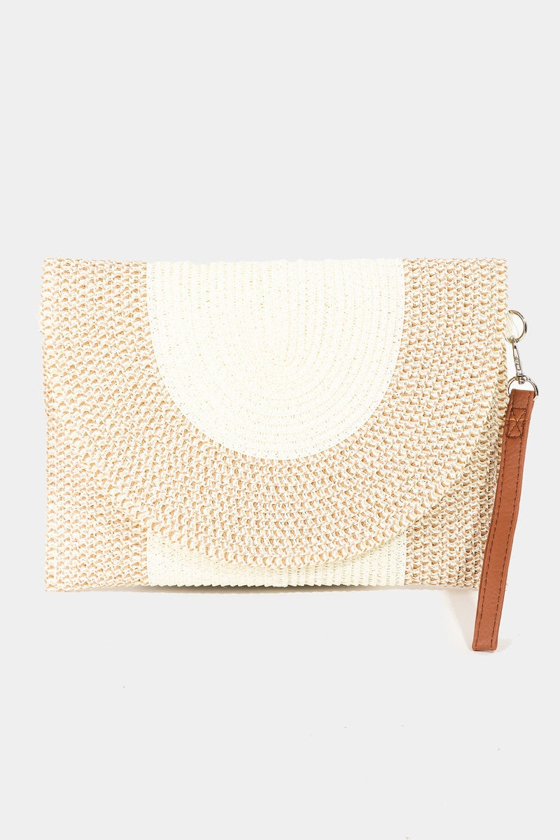 Featuring a two tone woven clutch