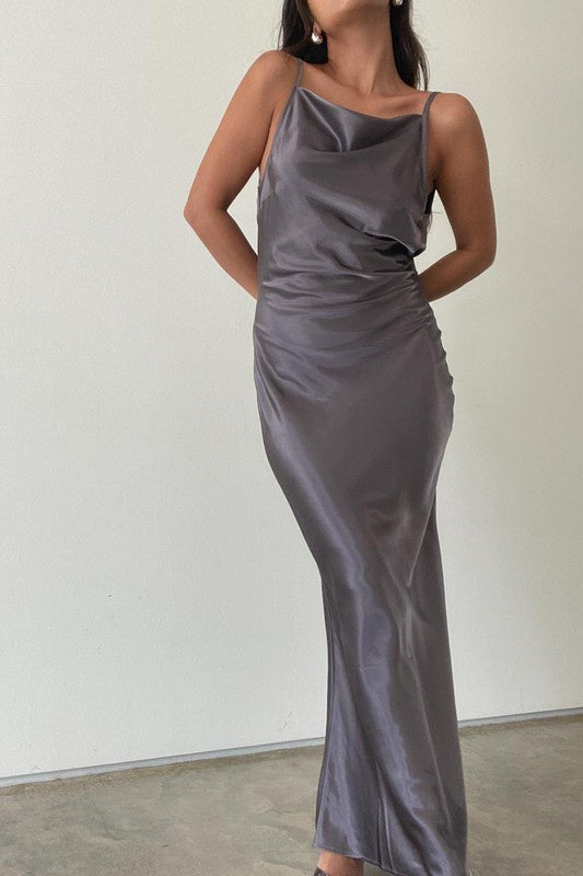 Featuring a thin strap satin cowl back maxi dress in the color deep silver 