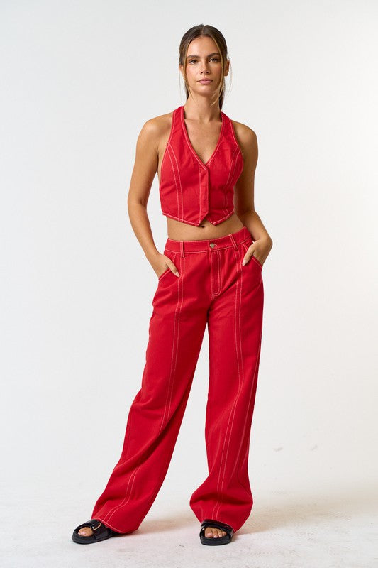 red, wide leg pants with white contrast stitching.