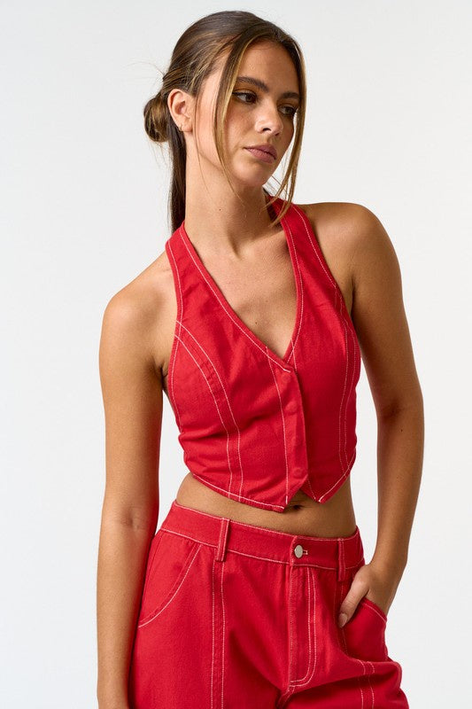 Red, v-neck vest with white contrast stitching.