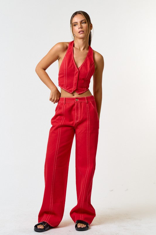 red, wide leg pants with white contrast stitching.