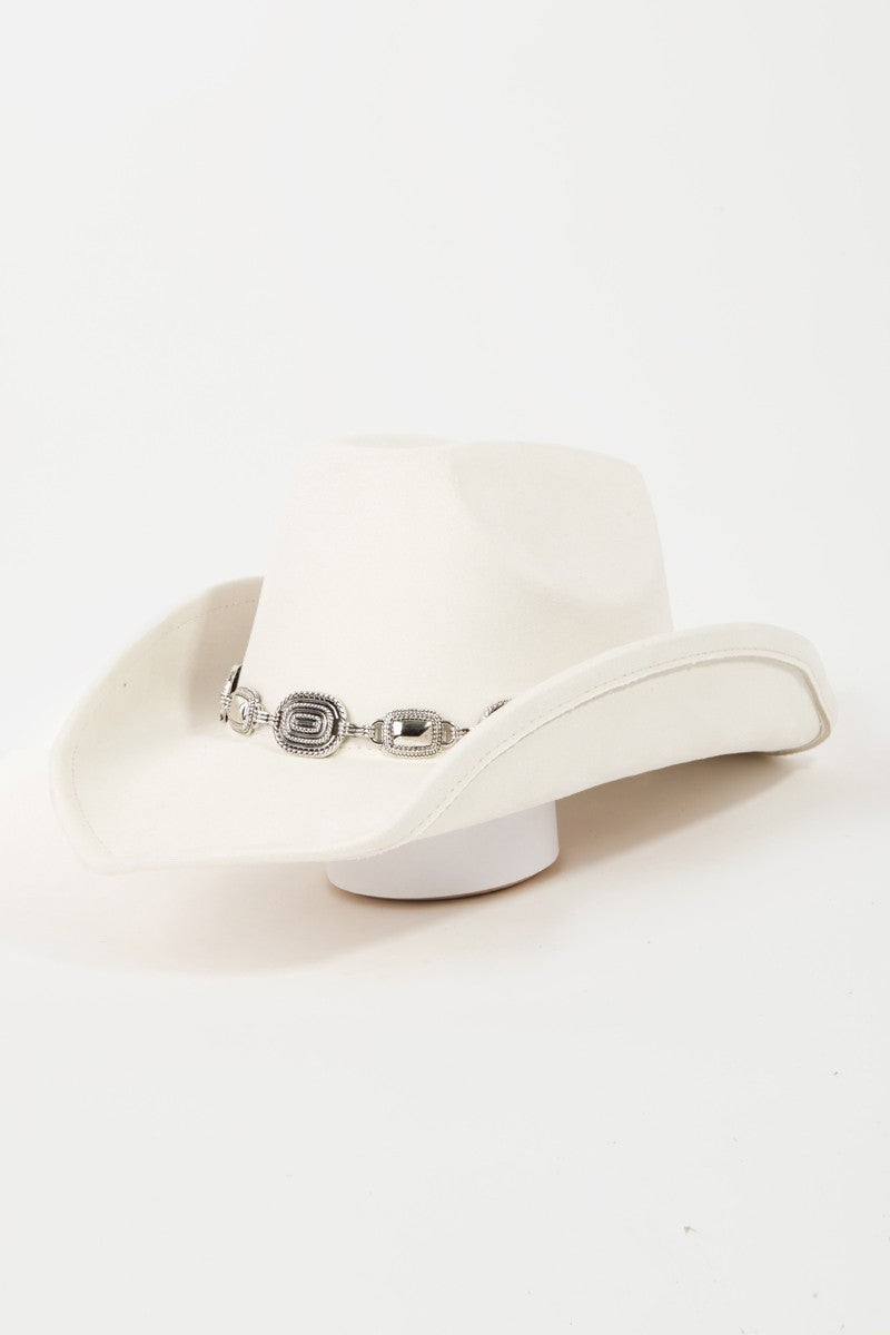 Featuring a curled brim hat with a sliver belt detail in the color ivory 