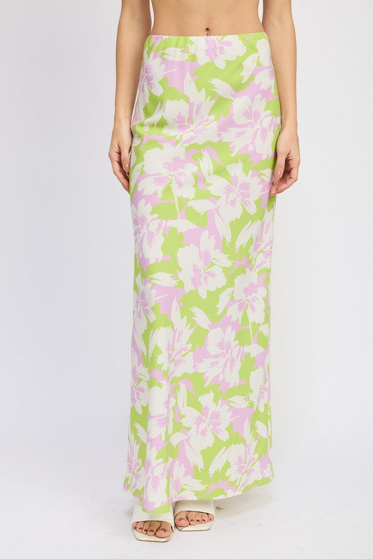Pairs with the matching kalias halter top Featuring a maxi floral flare skirt in the color lime 