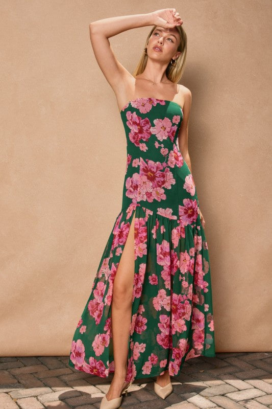 Featuring a green with pink florals strapless drop waist maxi dress with a floral print 