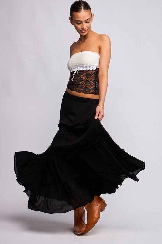 Featuring a breathable maxi skirt in the color black 
