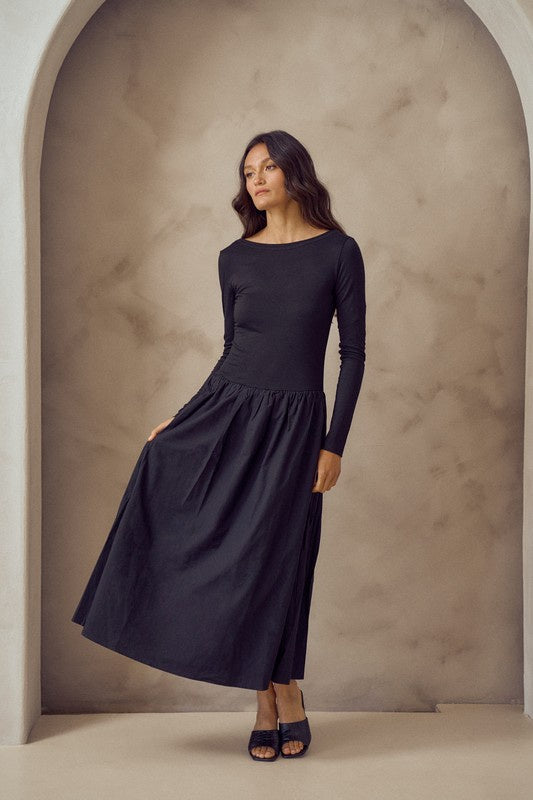 Featuring a longsleeve drop waist balletcore&nbsp;boat neck maxi dress in the color black