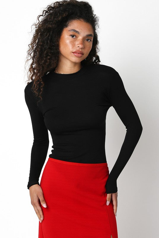 Featuring a long sleeve crew neck fitted body suit in the color black 