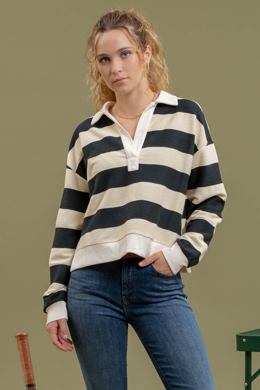 Featuring a Striped Collard V-neck top in the color cream and hunter green 