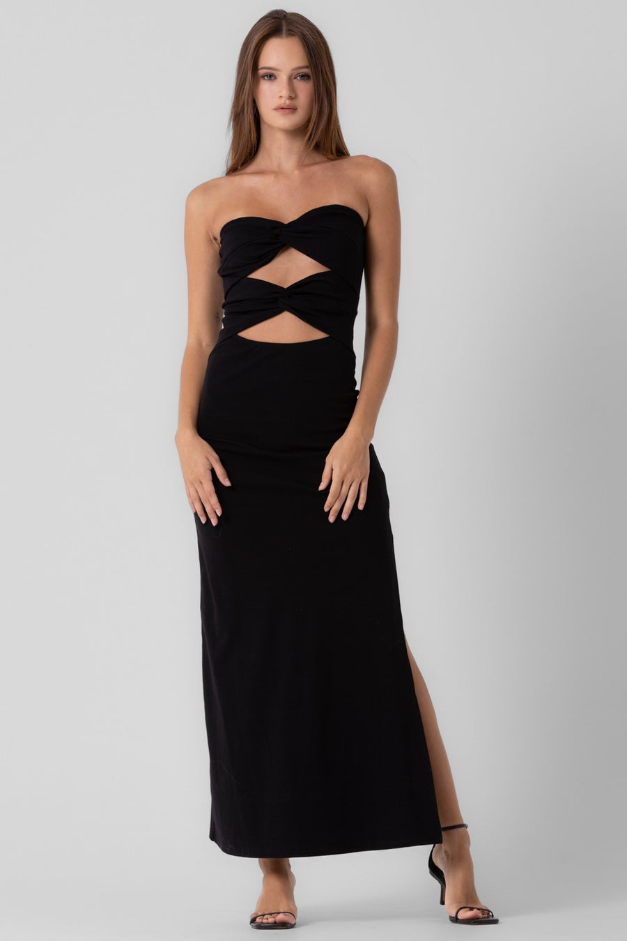 Featuring a midi cut-out knit front twist strapless dress