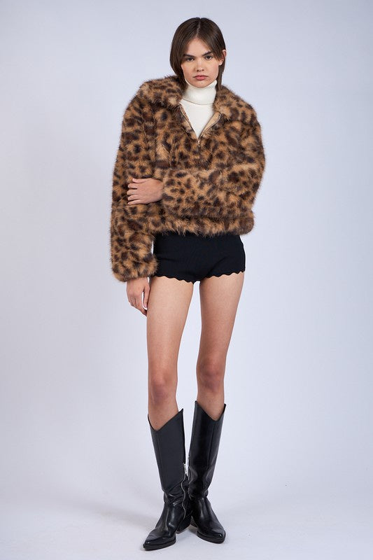 Featuring a cropped oversized jacket in the color leopard