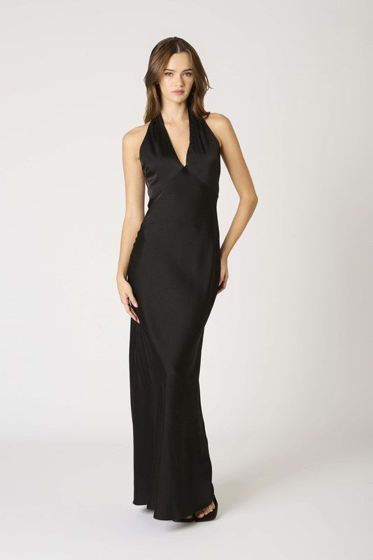 Featuring a black satin halter maxi dress