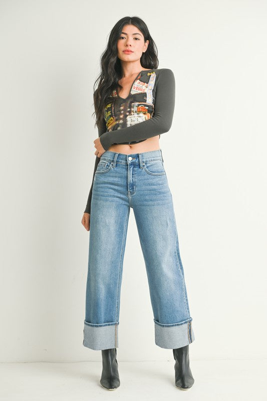 Featuring a petite style jean. Mid rise, wide leg with wide cuff