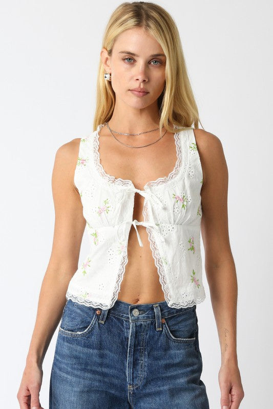 Featuring a lace hem top with double front tie