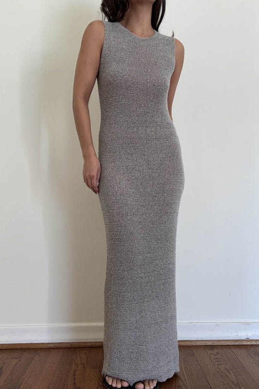 Featuring a sleeveless knit maxi dress