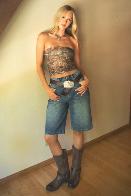 Featuring a denim baggy dad short in a medium wash