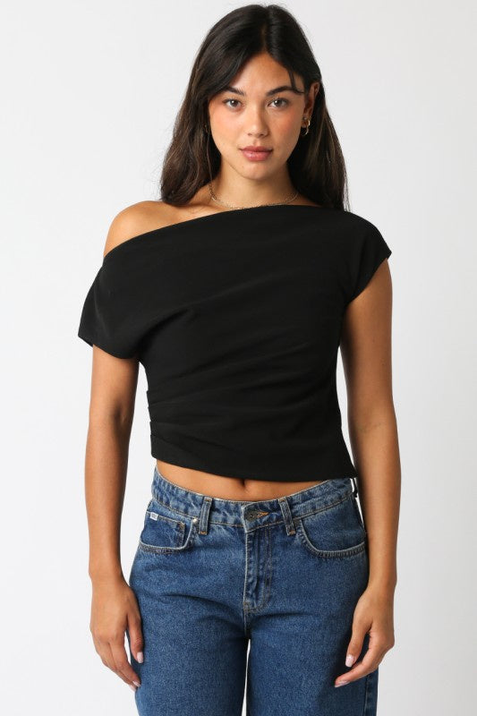 Featuring a black basic one shoulder top with a zipper closure