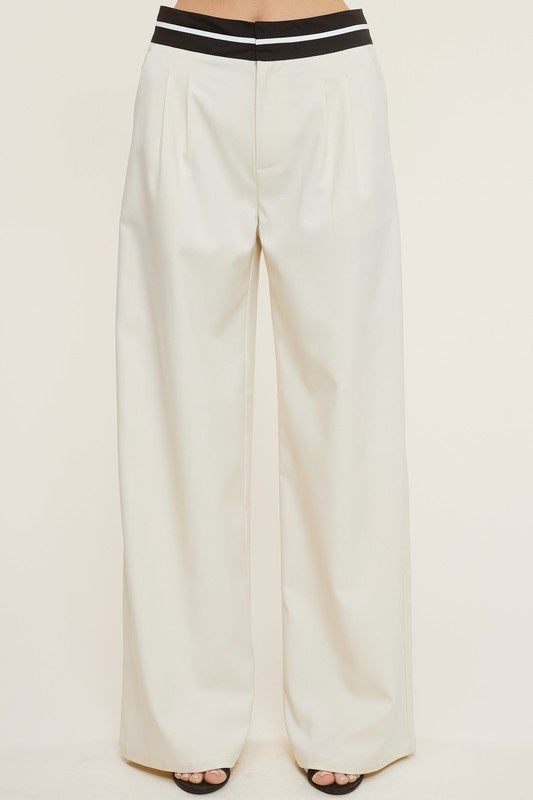 Featuring a white trouser with a contrasting black and white stipped waistband&nbsp;