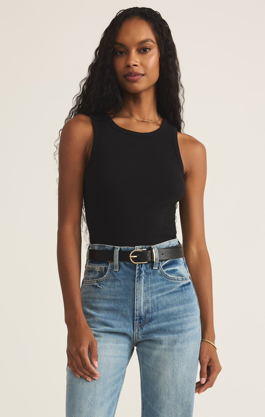 Featuring a ribbed fitted tank top in the color black 