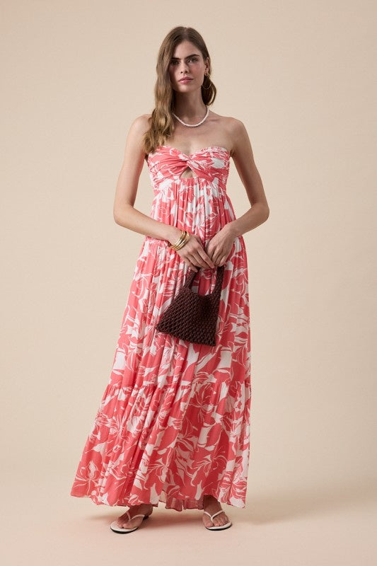 Featuring a coral ivory floral maxi dress with a sweetheart neckline