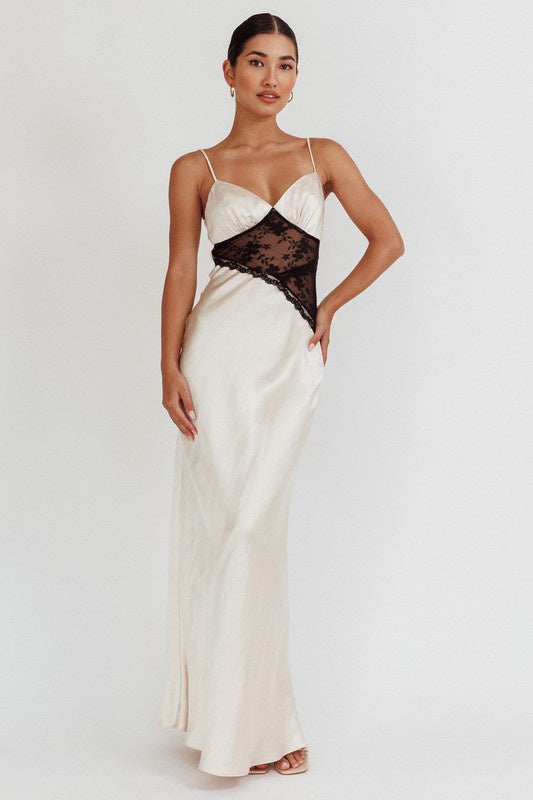 Featuring satin thin strap V-neck maxi dress with lace detailing and a low back in the color chapagne