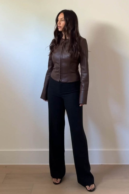 Featuring a fitted faux brown leather top