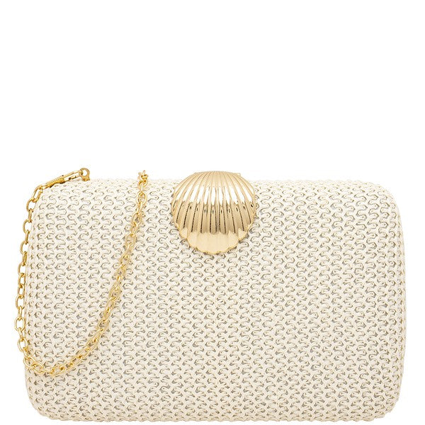 Featuring a small clutch with a golden sea shell clasp, comes with a detachable chain strap in the color white 