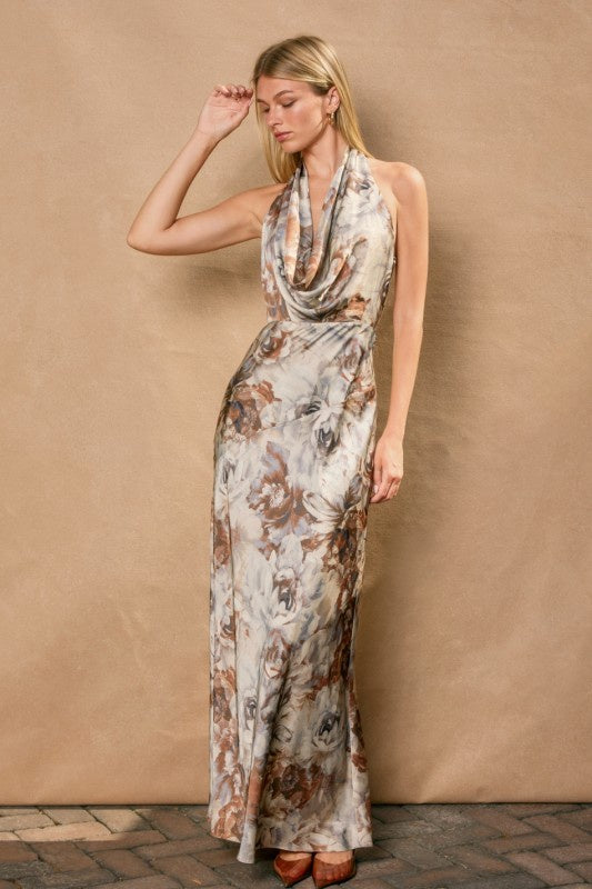 Featuring a draped halter neck maxi dress with a tie back