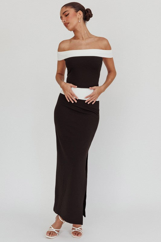 Pairs with the matching Luther Maxi Skirt

Featuring an off shoulder contrast cropped top in the color black and white 