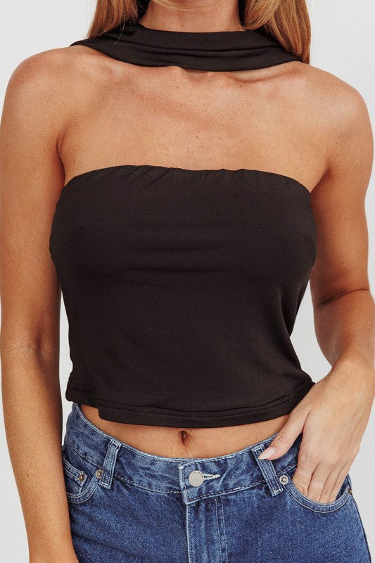 Featuring a reverse halter style top in the color black 