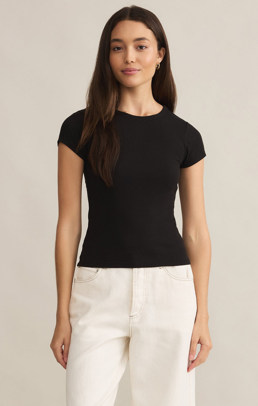 Featuring a crew neck short sleeve top with high stretch in the color black 