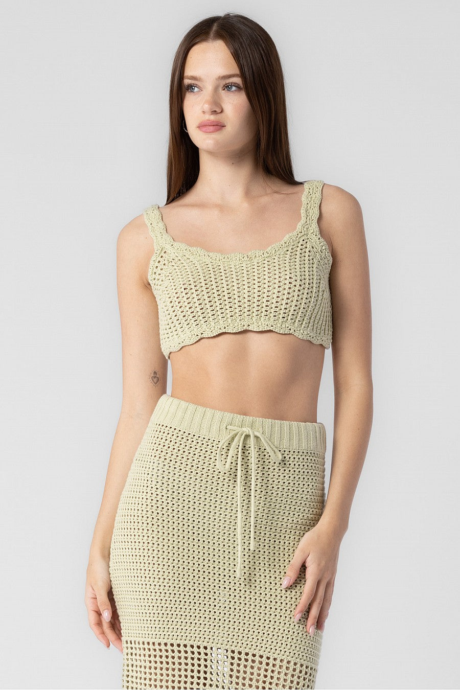 knitted crochet bralette top in the color sage.