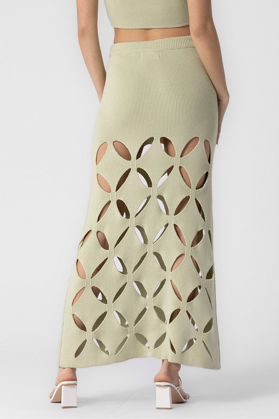 Midi skirt with cut outs in the color sage.