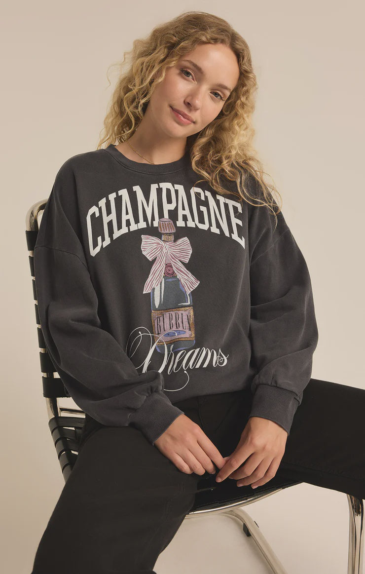 Featuring a long sleeve  cozy oversized crew neck sweatshirt in the color black sand