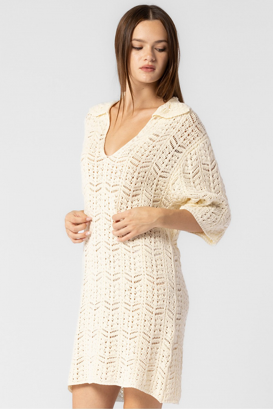 Cream colored crochet cover up dress.