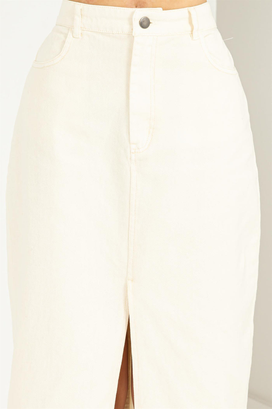 Cream midi skirt with slit.